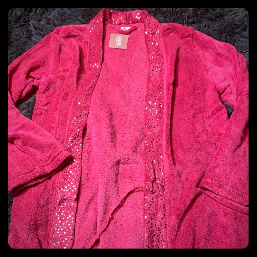Pink sparkling bathrobe